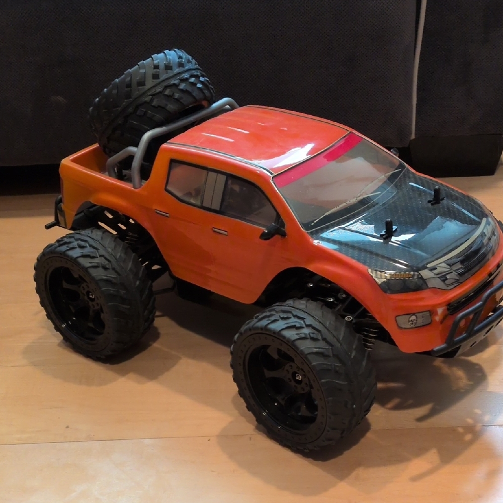 Orange and Black Toy RC Truck